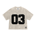STOLEN MESH JERSEY in beige mesh fabric with bold black '03' print on front, part of THE COLLEC's limited 'STOLEN GOODS' apparel collection.