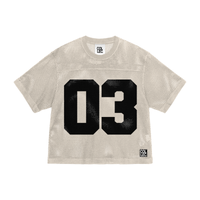 STOLEN MESH JERSEY in beige mesh fabric with bold black '03' print on front, part of THE COLLEC's limited 'STOLEN GOODS' apparel collection.